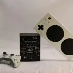 A standard controller, adroit, and Xbox adaptive controller